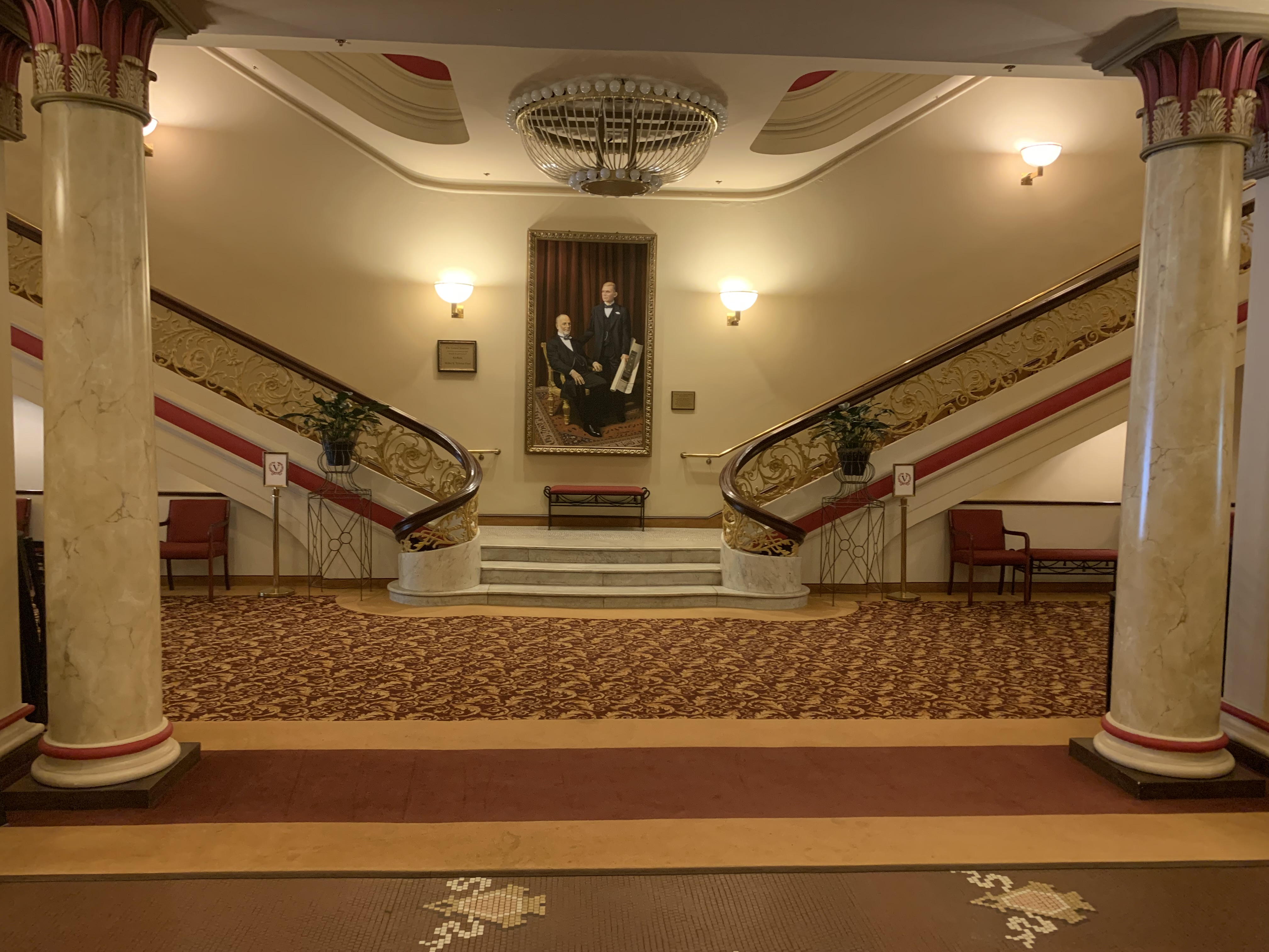 staircase photo of George and his father